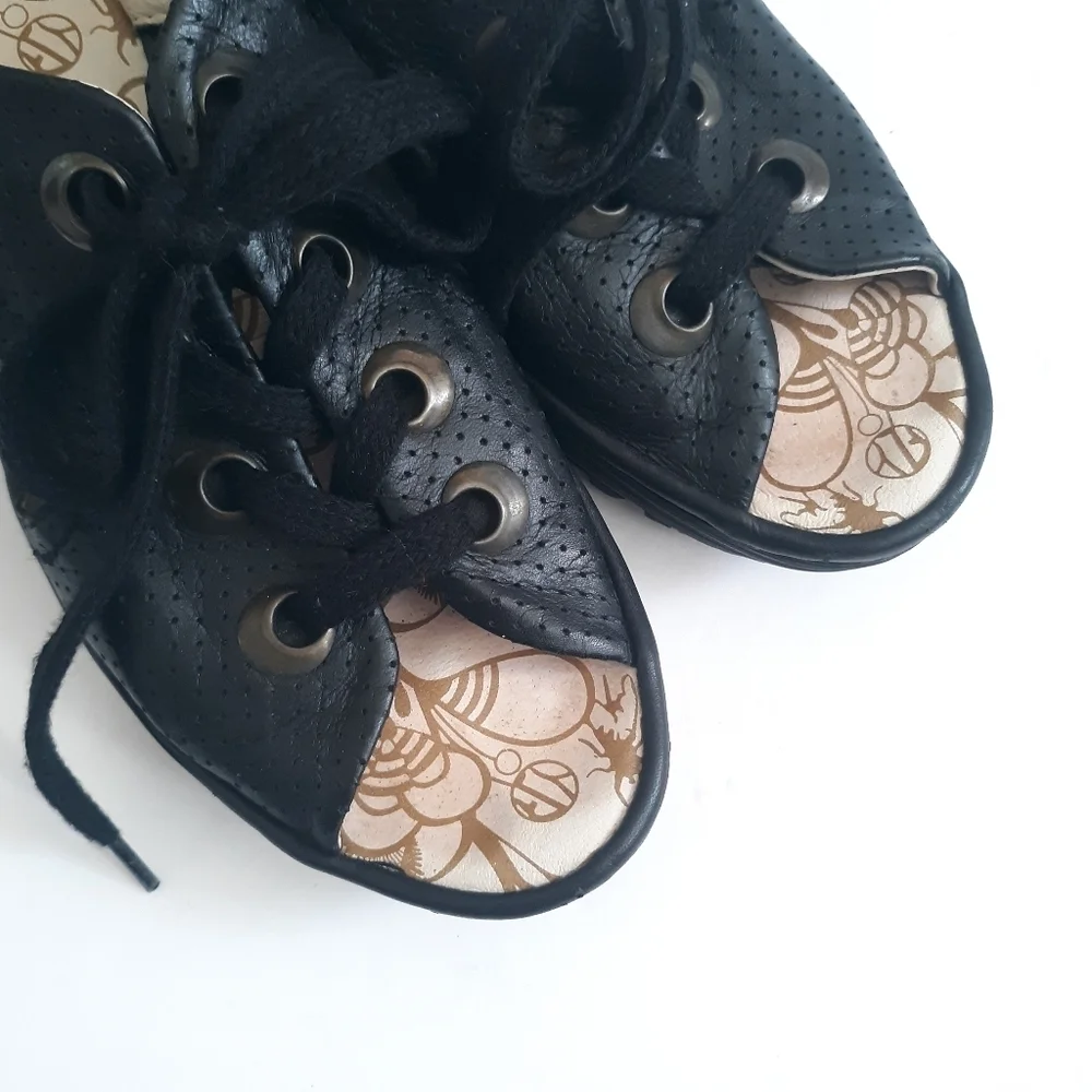 Fly London Ylfa Perforated Black Leather Wedge